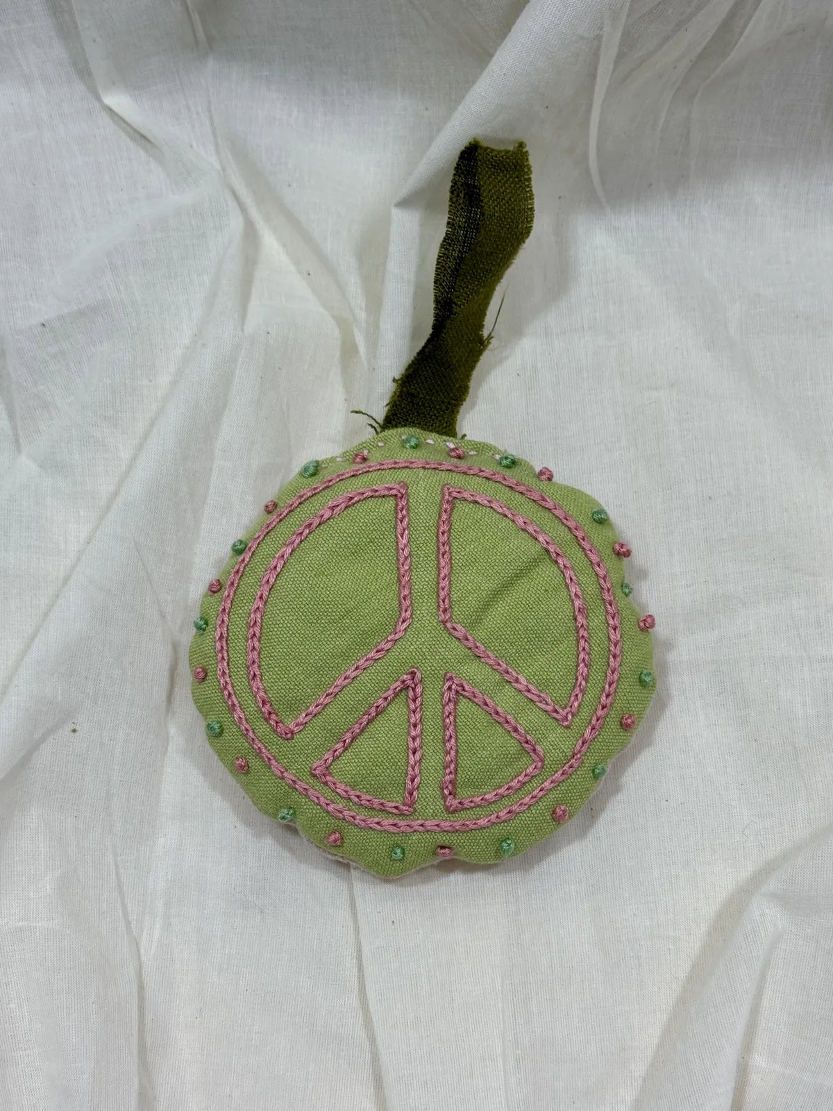 Round lavender embroidered pouch made of linen