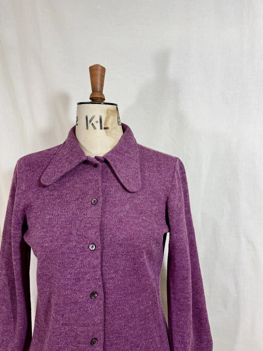 Purple wool cardigan on a mannequin with a white background