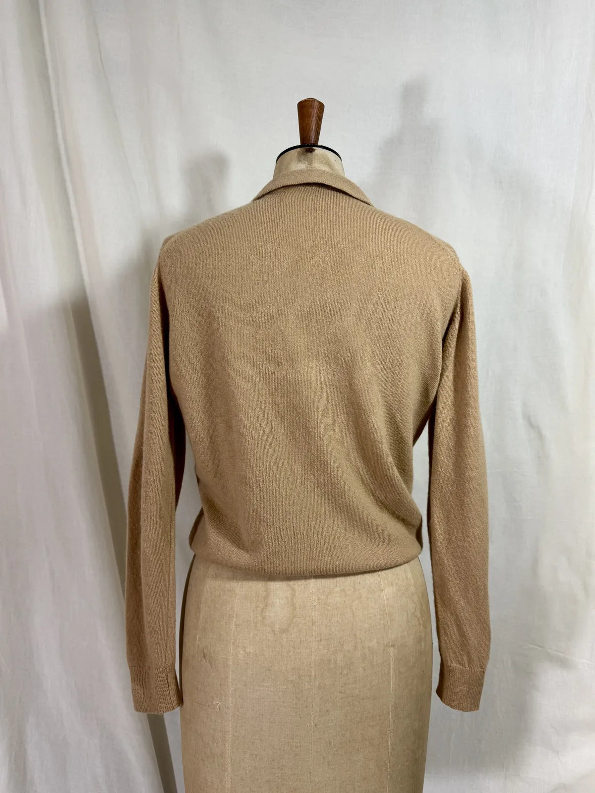 Brown cardigan against white backdrop