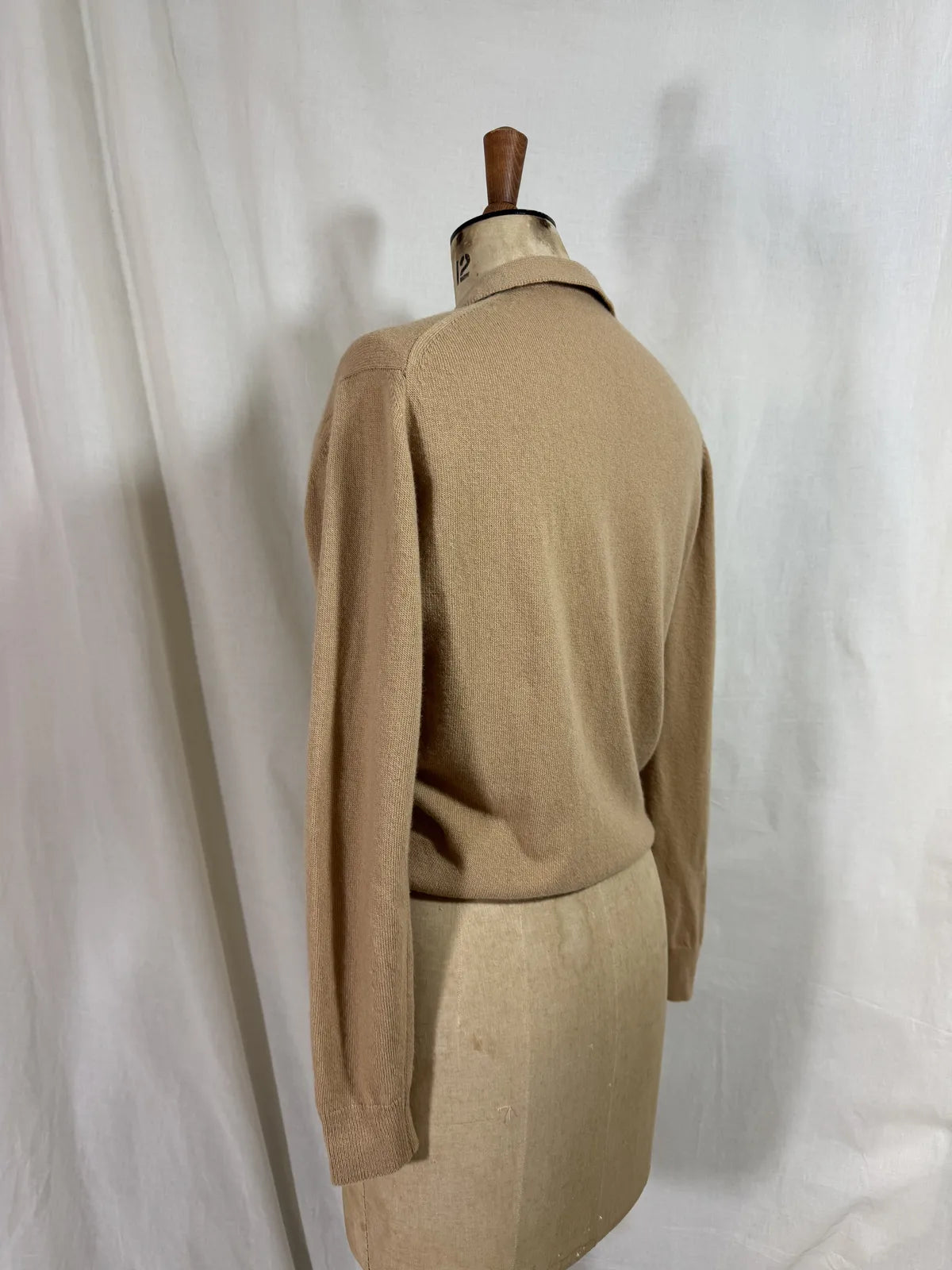 Brown cardigan against white backdrop