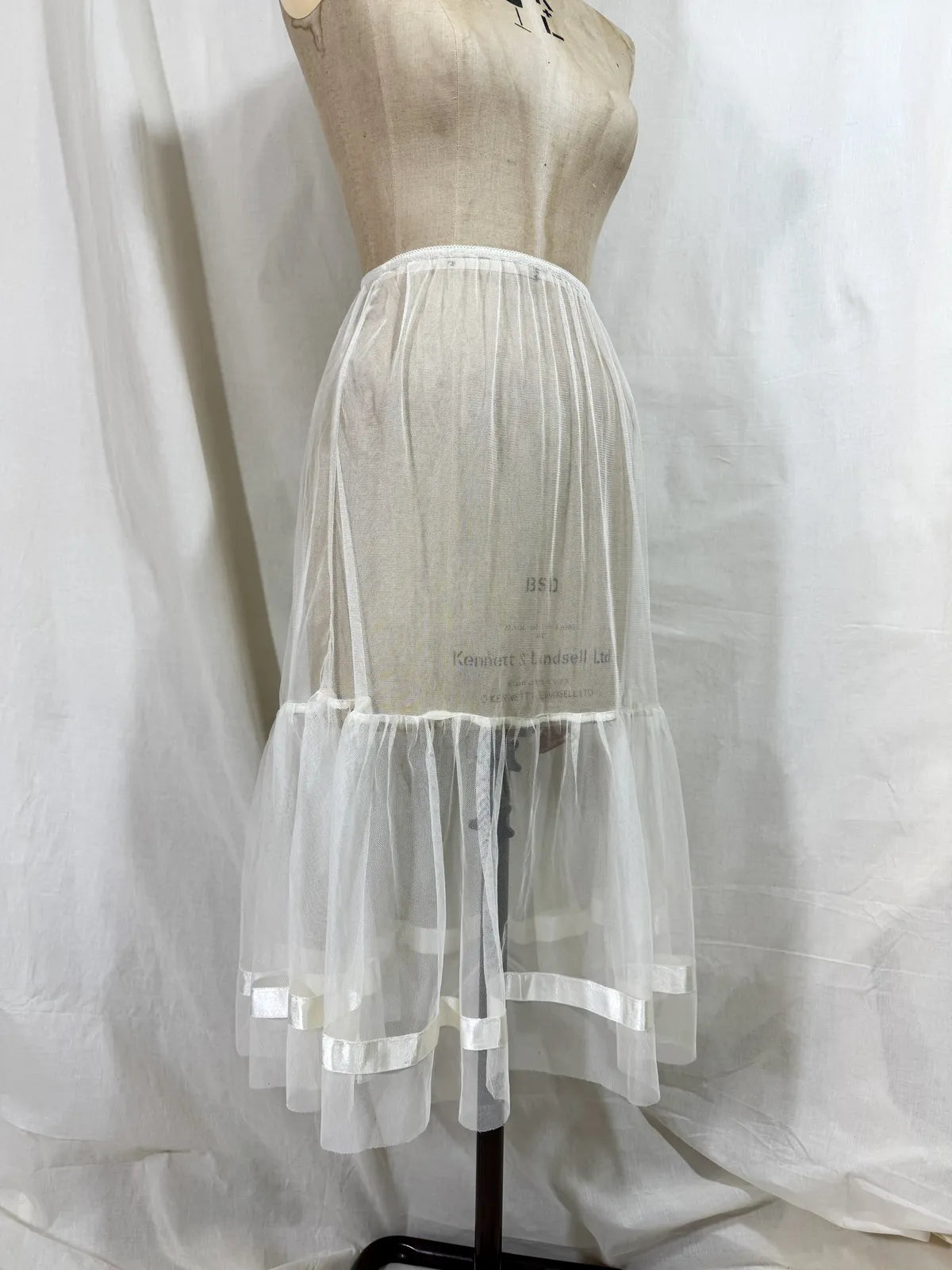 long white cotton tulle petticoat against a white background