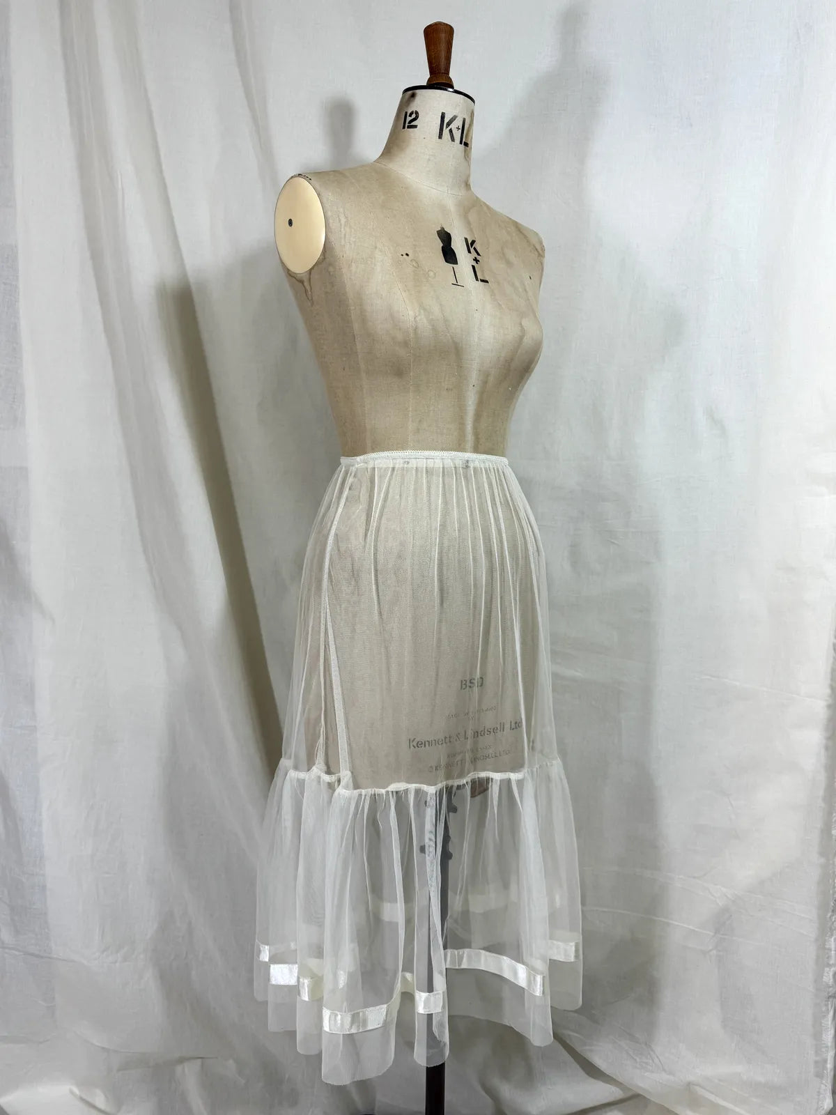 long white cotton tulle petticoat against a white background