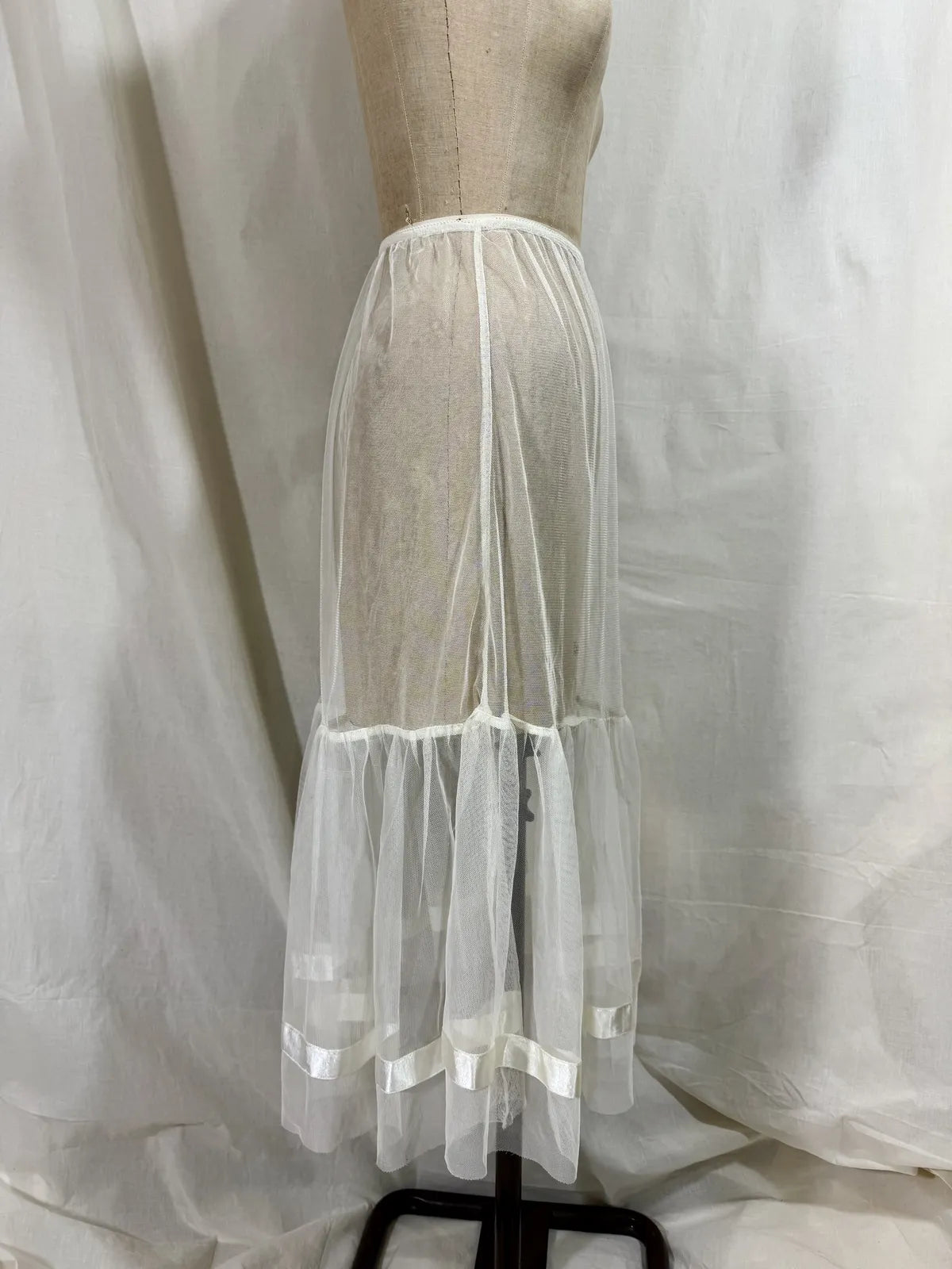 long white cotton tulle petticoat against a white background