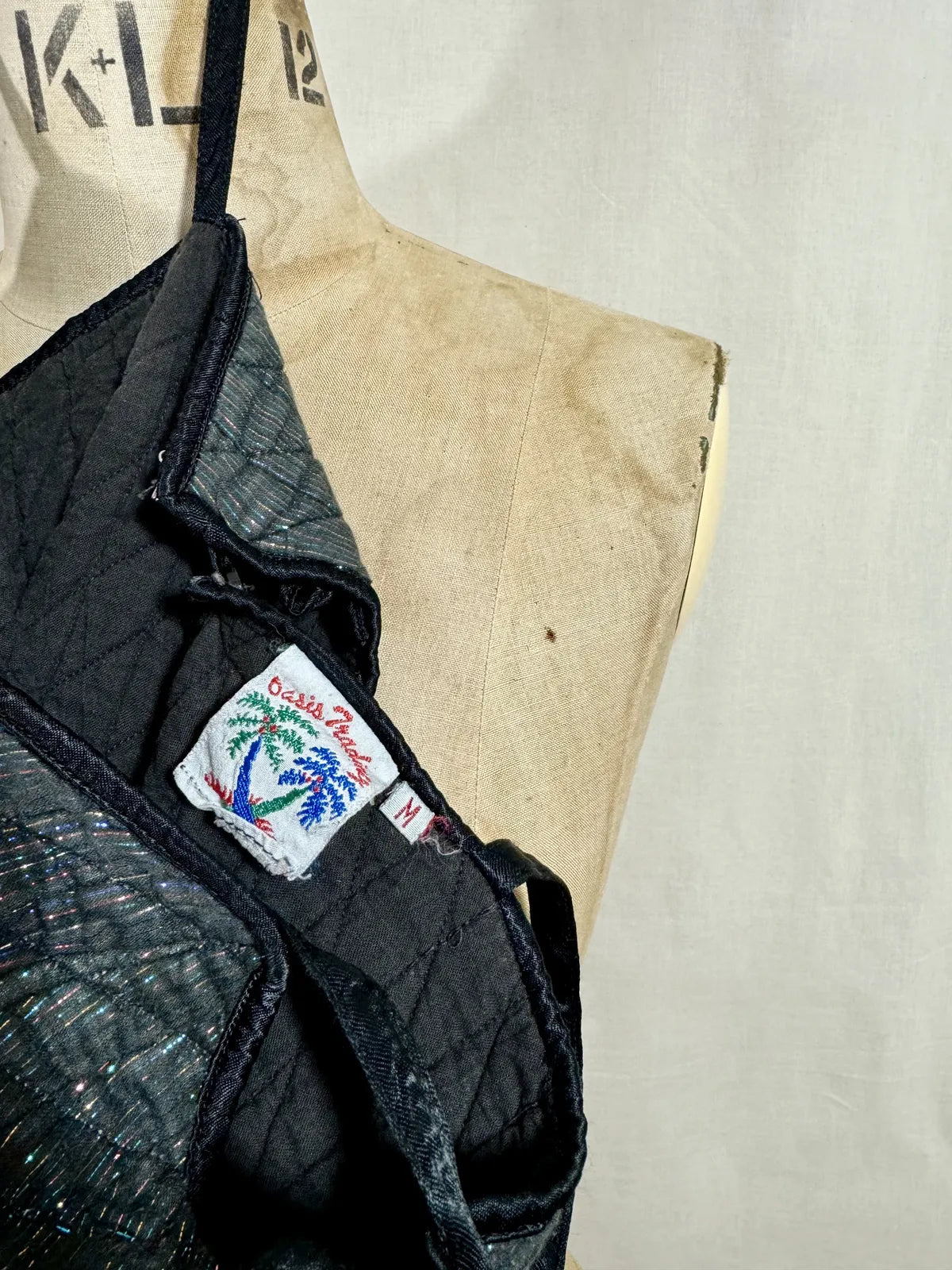 Black quilted bodice with a brand label , Oasis trading label