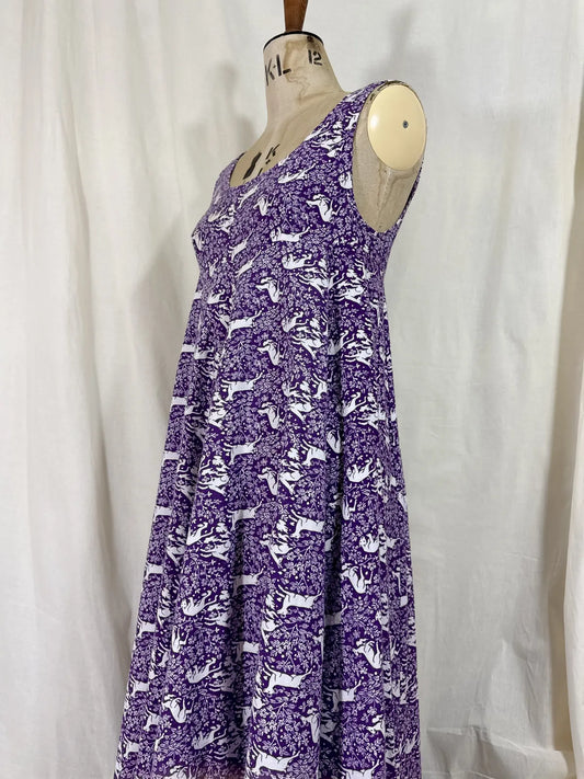 Purple maxi dress with lion and deer print on mannequin 