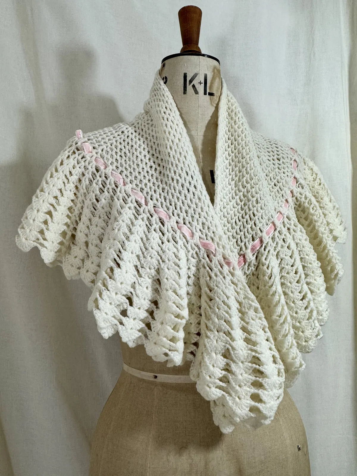 1930s cream crochet shawl with pink velvet ribbon