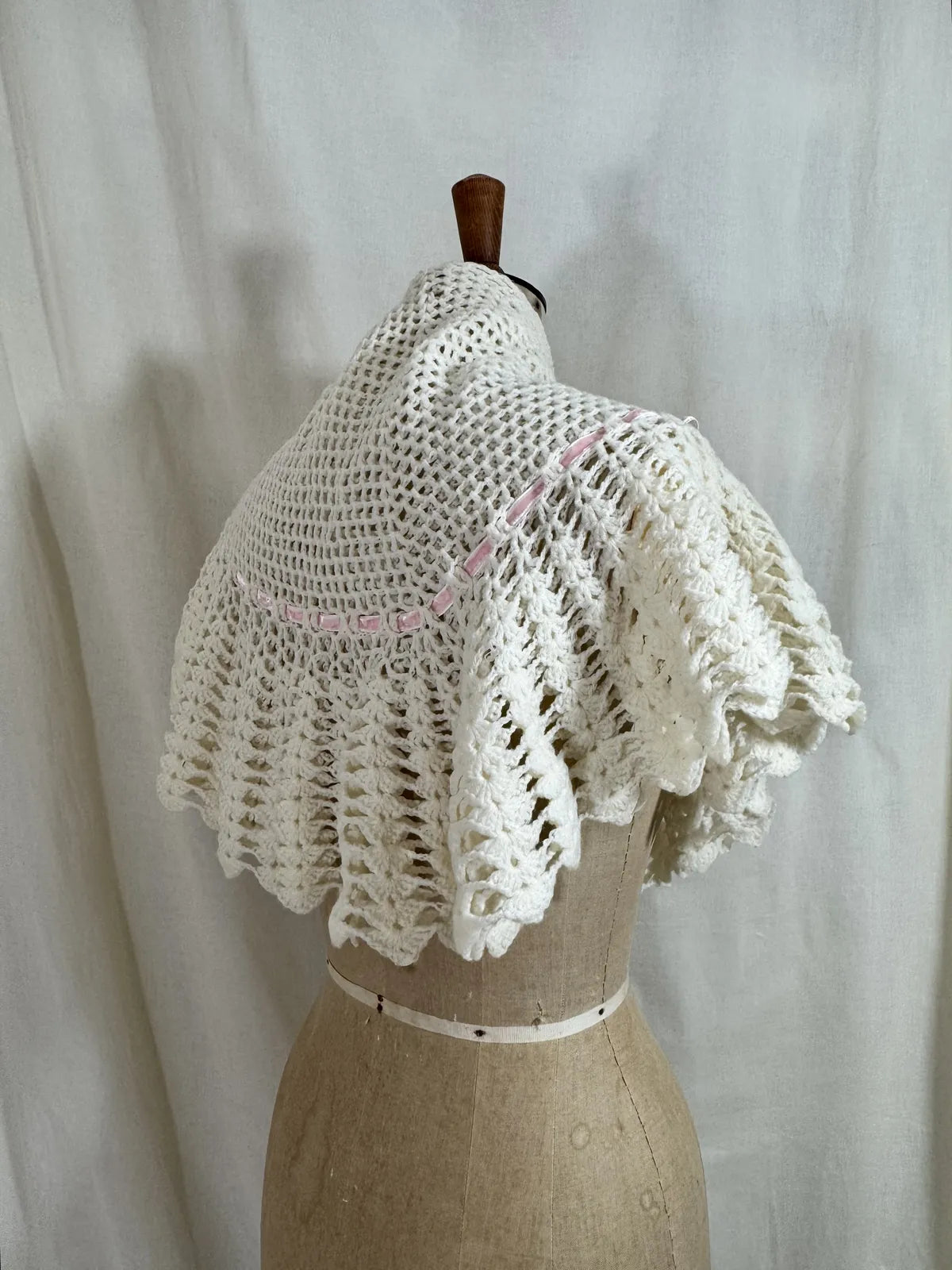 1930s cream crochet shawl with pink velvet ribbon
