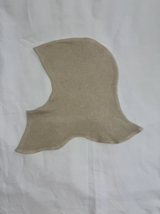 beige silk and cashmere hood on white background