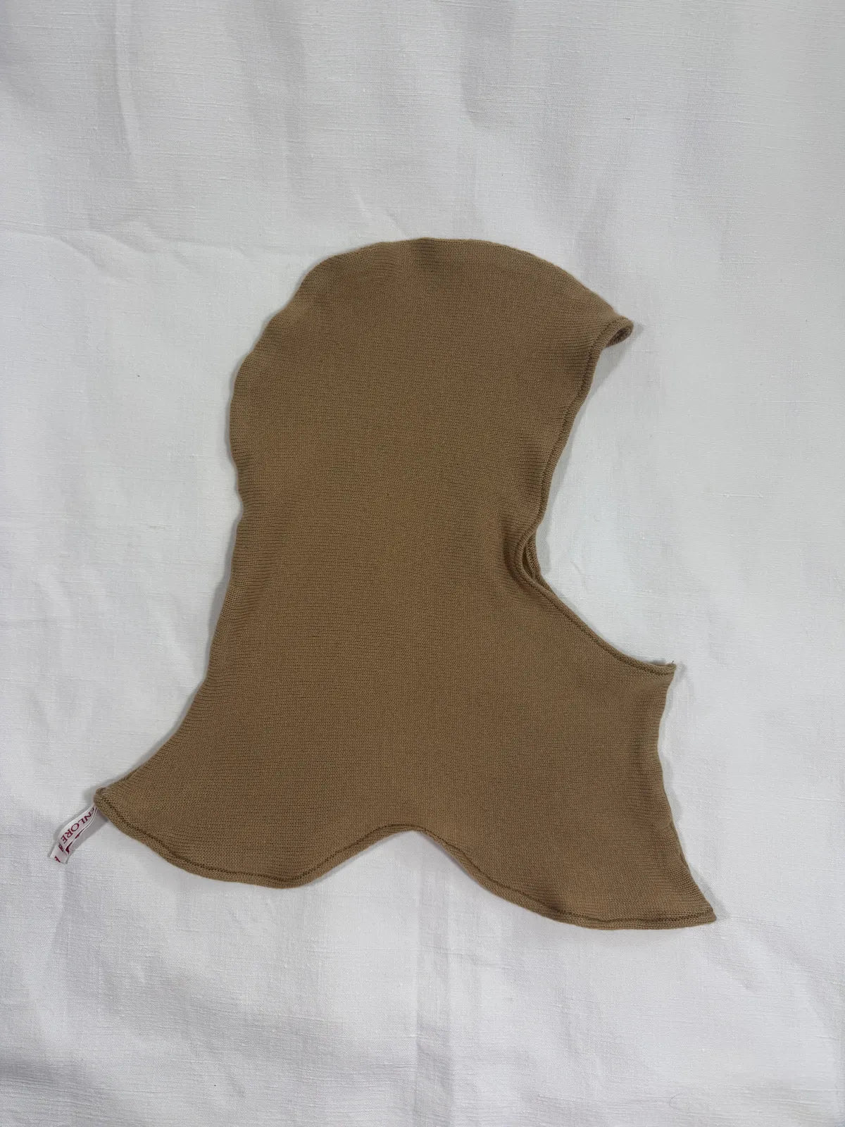 handmade brown cashmere hood on white background