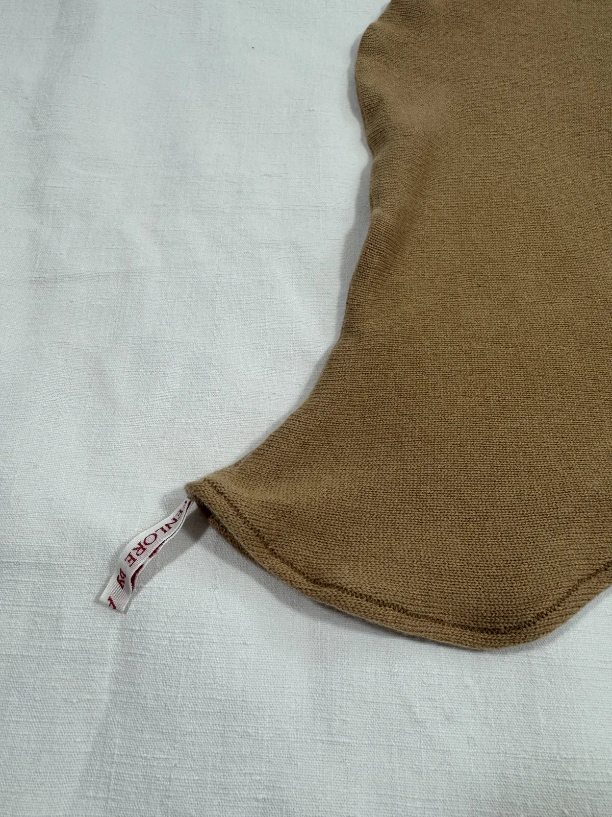 handmade brown cashmere hood on white background