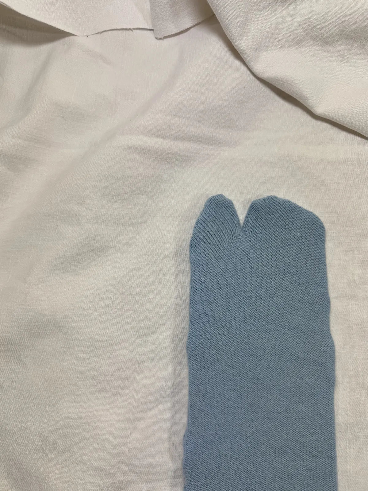 cashmere tabi bedsocks in blue on a white backdrop