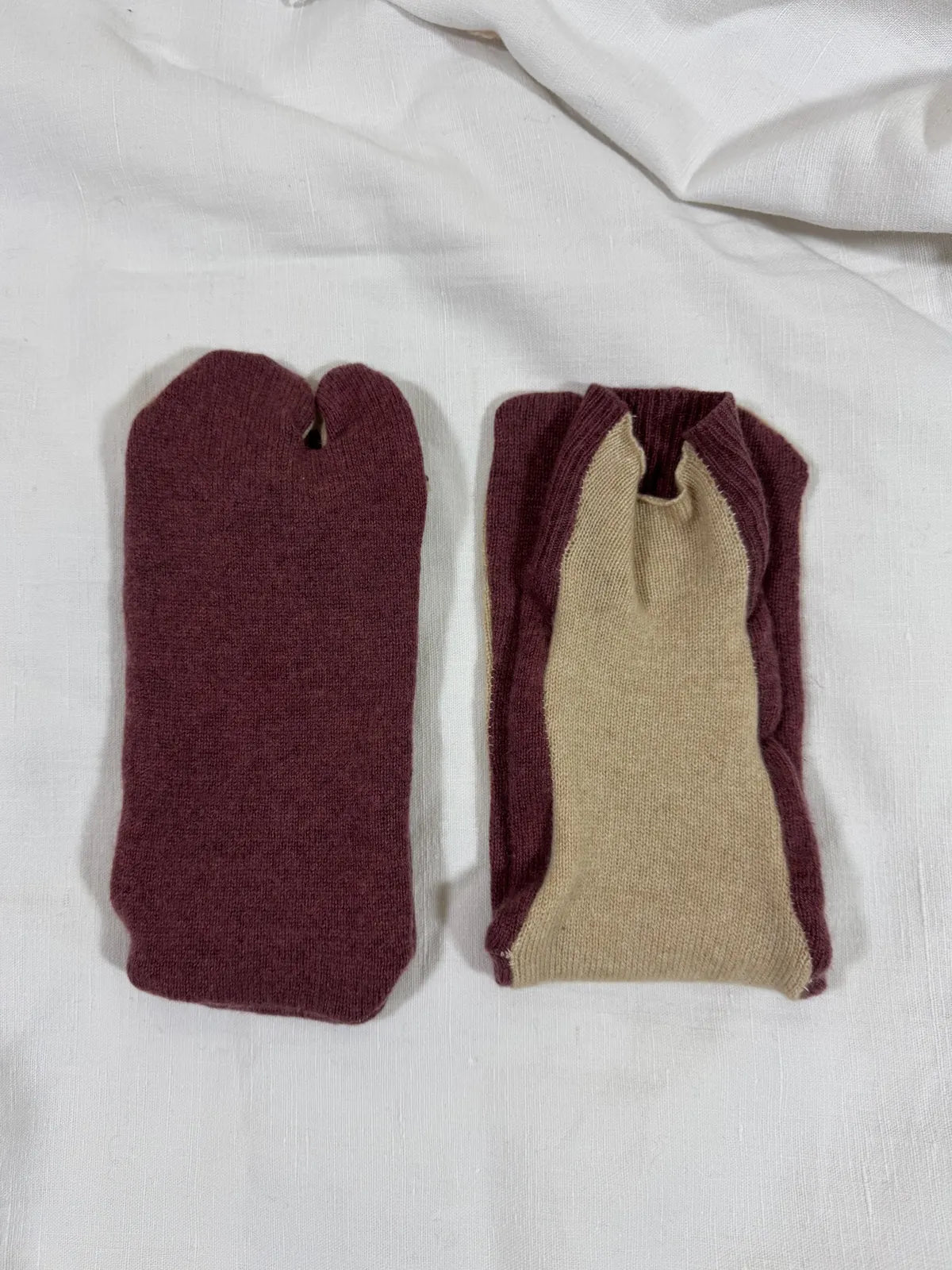 cashmere tabi bedsocks in maroon and beige on a white backdrop