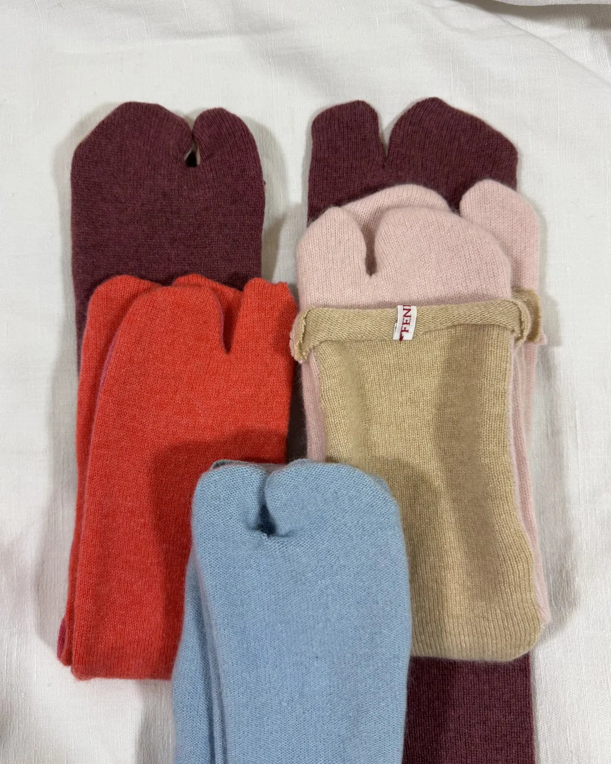 cashmere tabi bedsocks in different colours on a white backdrop